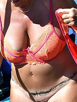 Mature whore is fingering her wet holes