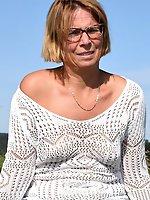 Mature woman with sexy piercings