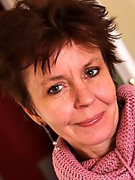 Mature woman playing with hot toy