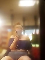 A collection of images featuring a voluptuous redhead with a curvy posterior