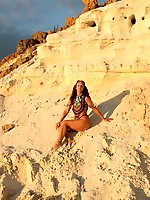 On sunset on pink sand