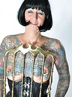 Photo shoot with full body tattooed MILF Cleo - 2