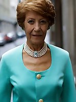 Elegant grannies wearing pearls